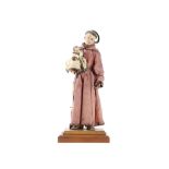 AN 18TH CENTURY NEAPOLITAN CRECHE-TYPE CARVED WOOD AND POLYCHROME DECORATED FIGURE OF SAINT
