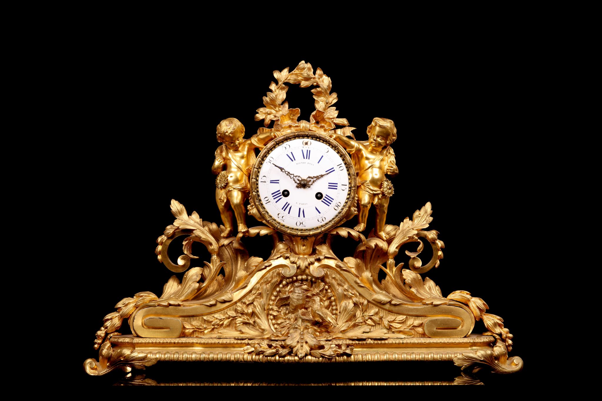 A THIRD QUARTER 19TH CENTURY FRENCH GILT BRONZE FIGURAL MANTEL CLOCK BY RAINGO FRERES, PARIS the