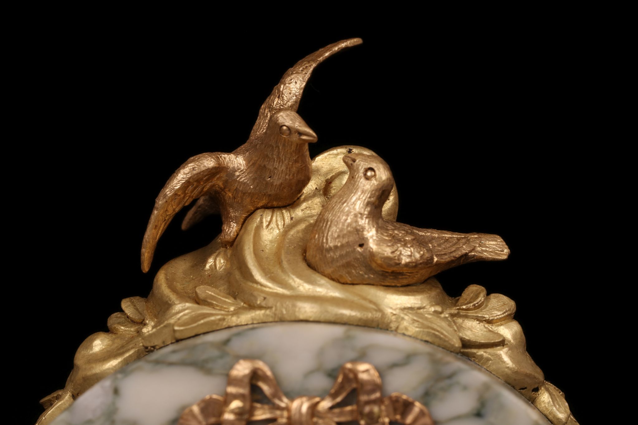 A LATE 19TH CENTURY FRENCH MARBLE AND GILT BRONZE MOUNTED BOUDOIR CLOCK the arched case surmounted - Image 4 of 7