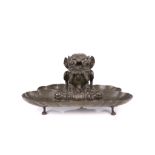 A 19TH CENTURY NORTH EUROPEAN BRONZE INKWELL IN THE PADUAN RENAISSANCE MANNER modelled as a