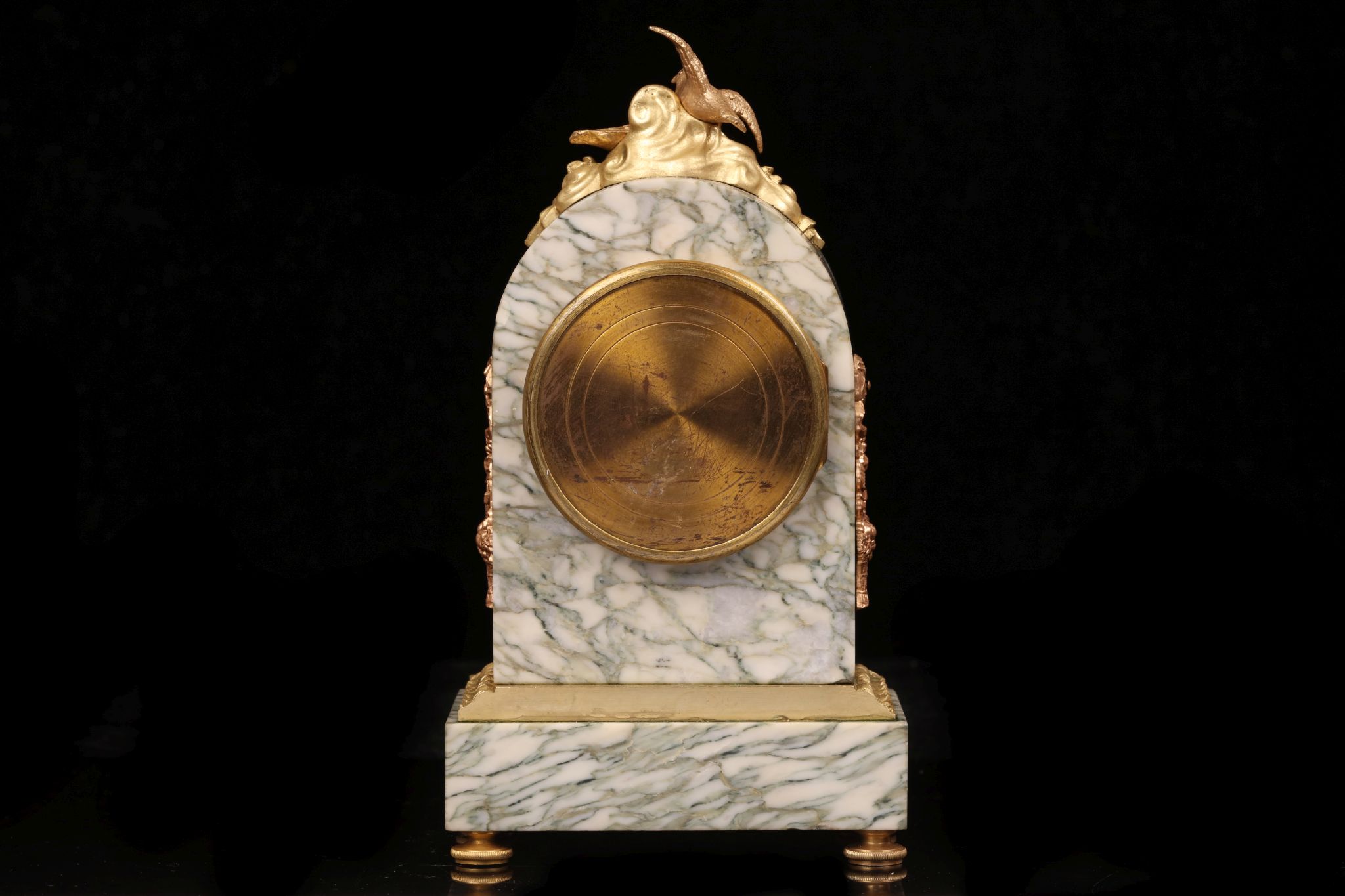A LATE 19TH CENTURY FRENCH MARBLE AND GILT BRONZE MOUNTED BOUDOIR CLOCK the arched case surmounted - Image 6 of 7