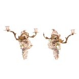 A PAIR OF MEISSEN STYLE PORCELAIN AND GILT BRONZE ROCOCO STYLE WALL LIGHTS the porcelain