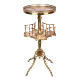 A FIRST HALF 20TH CENTURY GILT BRASS AND ONYX JARDINIERE STAND the circular, onyx top with