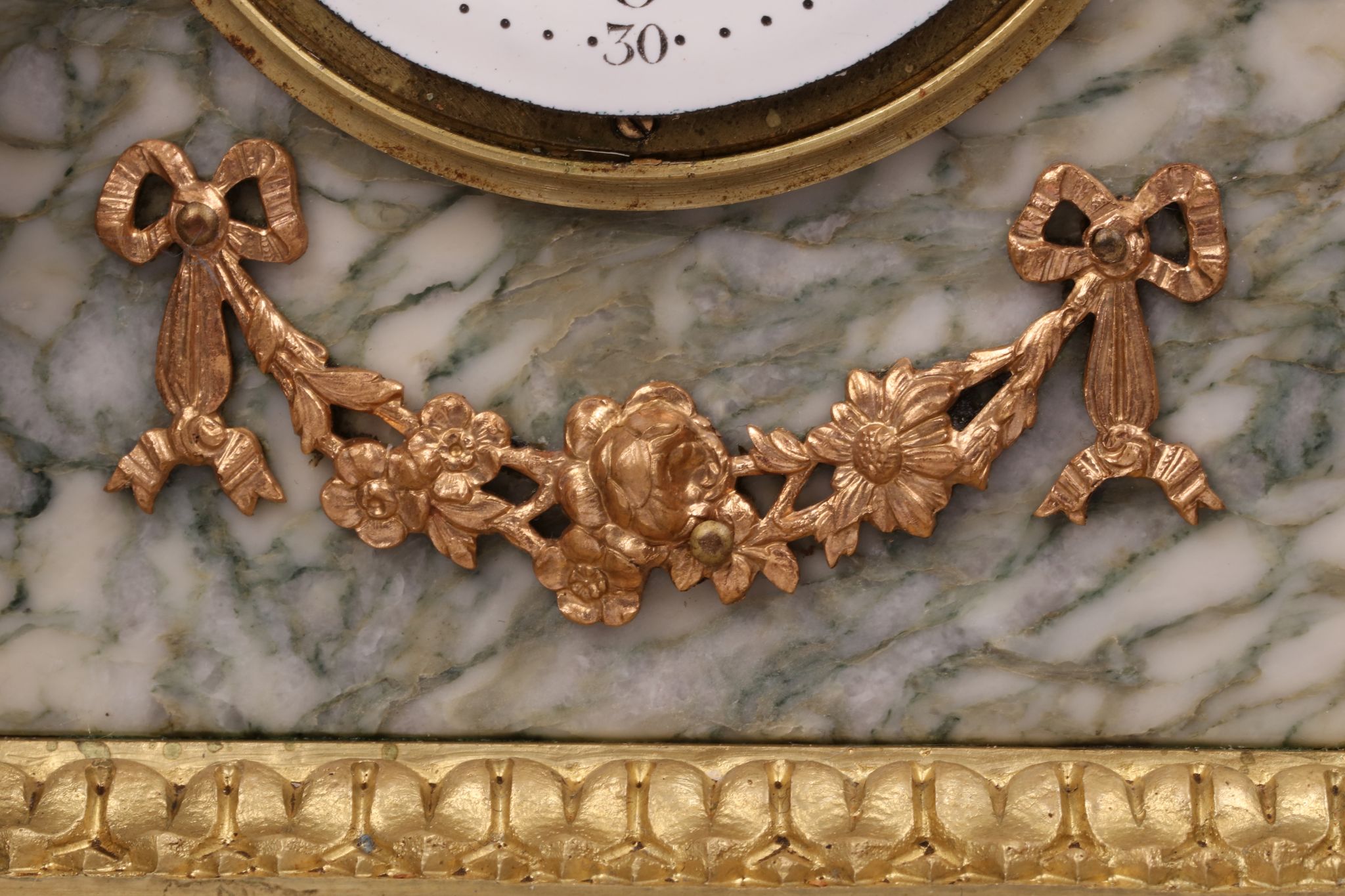 A LATE 19TH CENTURY FRENCH MARBLE AND GILT BRONZE MOUNTED BOUDOIR CLOCK the arched case surmounted - Image 3 of 7