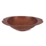 A MID 20TH CENTURY SAMOAN CARVED WOOD BOWL the rim carved with integral fin like handles with