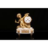 A LATE 19TH CENTURY GILT BRONZE AND WHITE MARBLE FIGURAL MANTEL CLOCK THE DIAL SIGNED 'DENISART