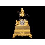 A MID 19TH CENTURY FRENCH GILT AND PATINATED BRONZE FIGURAL MANTEL CLOCK DECORATED WITH AN OTTOMAN