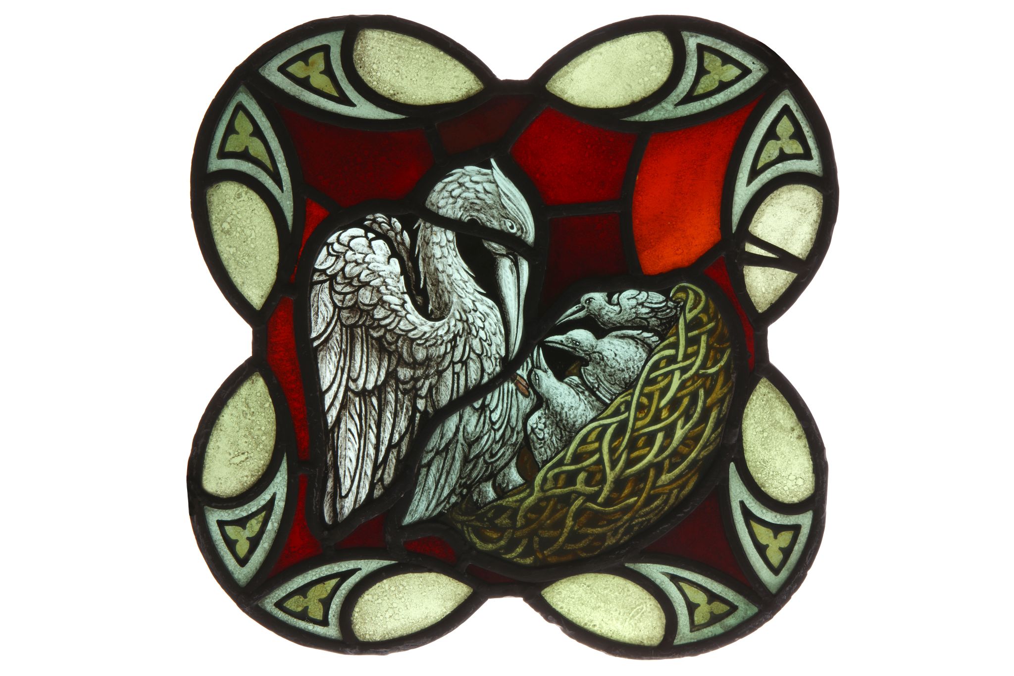 A STAINED GLASS PANEL DEPICTING THE PELICAN IN HER PIETY, POSSIBLY 17TH CENTURY of quatrefoil