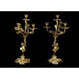 A PAIR OF LATE 19TH CENTURY FRENCH GILT BRONZE FIGURAL CANDELABRA DEPICTING ALLEGORIES OF PAINTING
