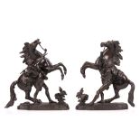 AFTER GUILLAUME COUSTOU (FRENCH, 1677-1746): A PAIR OF 19TH CENTURY BRONZE MODELS OF THE MARLY /
