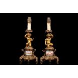 A PAIR OF MID 19TH CENTURY FRENCH GILT BRONZE AND SEVRES STYLE PORCELAIN MOUNTED FIGURAL LAMP