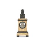 A SECOND QUARTER 19TH CENTURY FRENCH SIENNA MARBLE AND PATINATED BRONZE MANTEL CLOCK the plinth case
