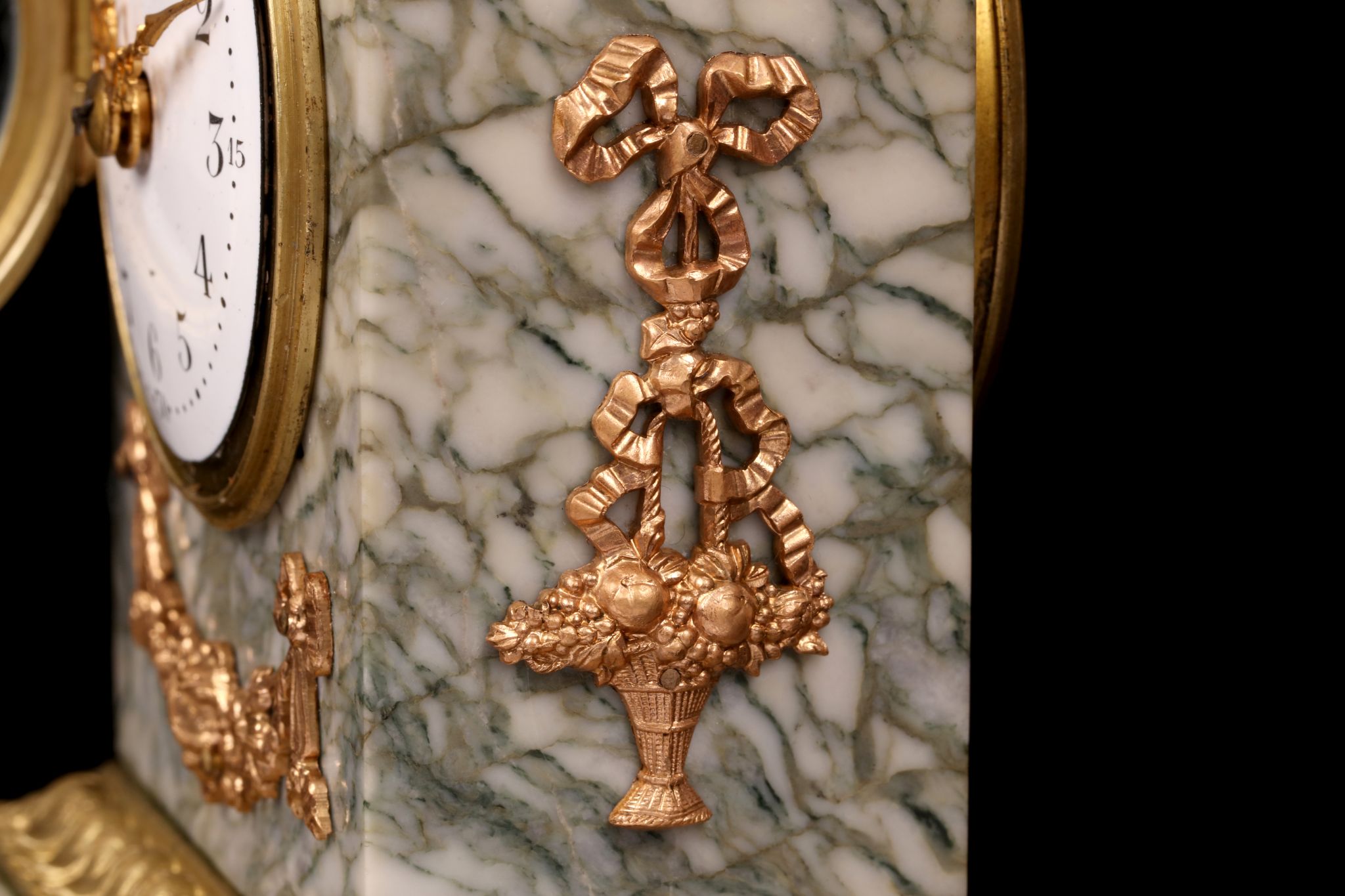 A LATE 19TH CENTURY FRENCH MARBLE AND GILT BRONZE MOUNTED BOUDOIR CLOCK the arched case surmounted - Image 5 of 7