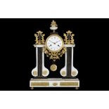 A LOUIS XVI PERIOD WHITE AND BLACK MARBLE AND GILT BRONZE MOUNTED PORTICO CLOCK BY CAILLOUET A PARIS