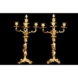 A PAIR OF LATE 19TH CENTURY FRENCH GILT BRONZE ROCOCO STYLE CANDELABRA each with four acanthus