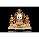 A FINE THIRD QUARTER 19TH CENTURY FRENCH GILT BRONZE AND WHITE MARBLE FIGURAL MANTEL CLOCK BY RAINGO