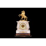 A LATE 19TH CENTURY FRENCH GILT METAL AND ALABASTER MANTEL CLOCK DECORATED WITH A MARLY HORSE the
