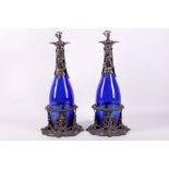 A pair of blue bottles with white metal mounts, 36cm high.