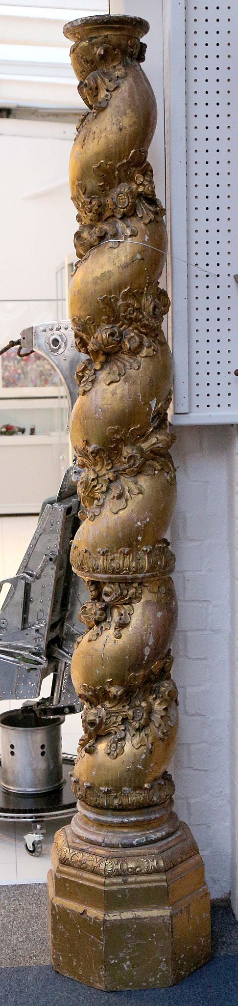 An 18th Century Italian baroque spiral carved giltwood column, with separate base, 225cm total