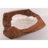 A rough Hewn wooden bowl, formed from a driftwood section, the interior lined with mother of