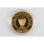 A 22ct Bahrain 'Hamad Town' 16g gold coin, in case.