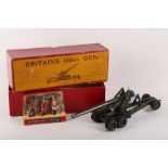 A boxed Britain 155mm gun, patent no. 617492, model 2064, sold with shells etc, and 3 Britain's