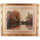 A Gothic style gilt framed coloured etching of a French view, indistinctly signed, 49 x 63cm.