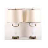 A pair of late 19th / early 20th Century Vaseline vase lamps with gilt fittings, including bases (