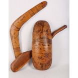 An Aboriginal boomerang, shield and club, 36-50cm long (3). Provenance: Purchased in Australia in