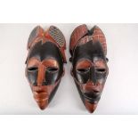 Two Punu masks, Gabon, 40-44cm high (2).