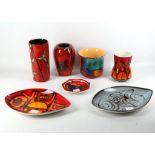 A selection of Poole Pottery items, to include three Delphis range examples, painted in iron-red
