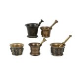 A COLLECTION OF 17TH CENTURY AND LATER BRONZE AND BELL METAL PESTLE AND MORTARS INCLUDING AN EXAMPLE