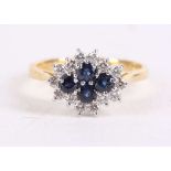 A sapphire and diamond cluster ring, Set with circular-cut sapphires and brilliant-cut diamonds,