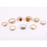 A collection of rings, Including five 18 and 9 carat gold signet rings, one set with tiger's eye,