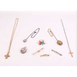 A collection of jewellery, Including three bar brooches, two cross pendant necklaces, three lockets,