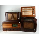 Four vintage radios, to include two Bakelite examples by G.E.C. and Philips, and two wooden cased