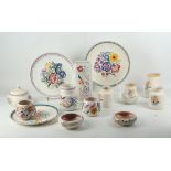 A collection Poole pottery, mid 20th Century vases, bowls and plates, all hand painted with