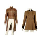 Two Moloh coats, one of plaid design with waistcoat style fastening, the other orange and cream,