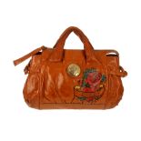 Gucci tan leather Tattoo handbag, with central gilt metal medallion and rose and heart design,