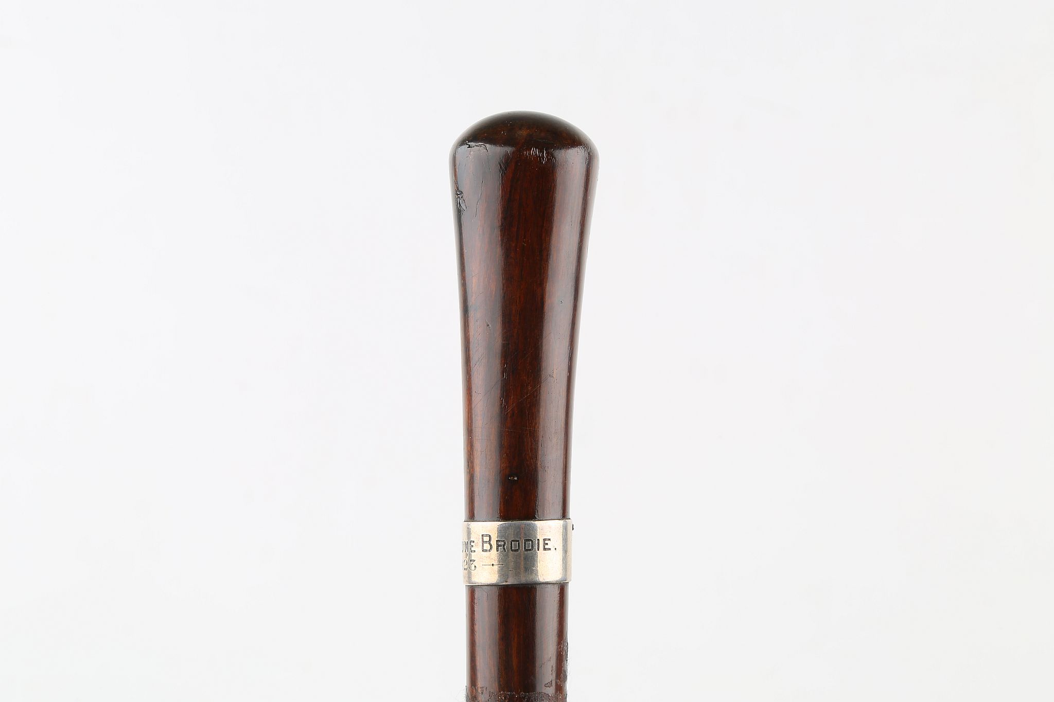 A LIGNUM VITAE CANE, with silver collar engraved 'Capt. R. Hume Brodie 1923', 36 inches (93cm). - Image 3 of 6