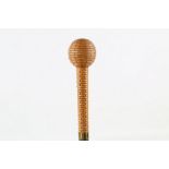 AN INTERESTING EARLY WALKING STICK, with handle carved to simulate wicker, 36 inches (92cm).