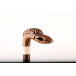 AN UNUSUAL CARVED WOOD ANIMAL HANDLE c.1870, with an ivory collar, 89cm.