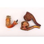 Two late 19th / early 20th Century carved Meerschaum pipes (1 boxed), one having a carved natives