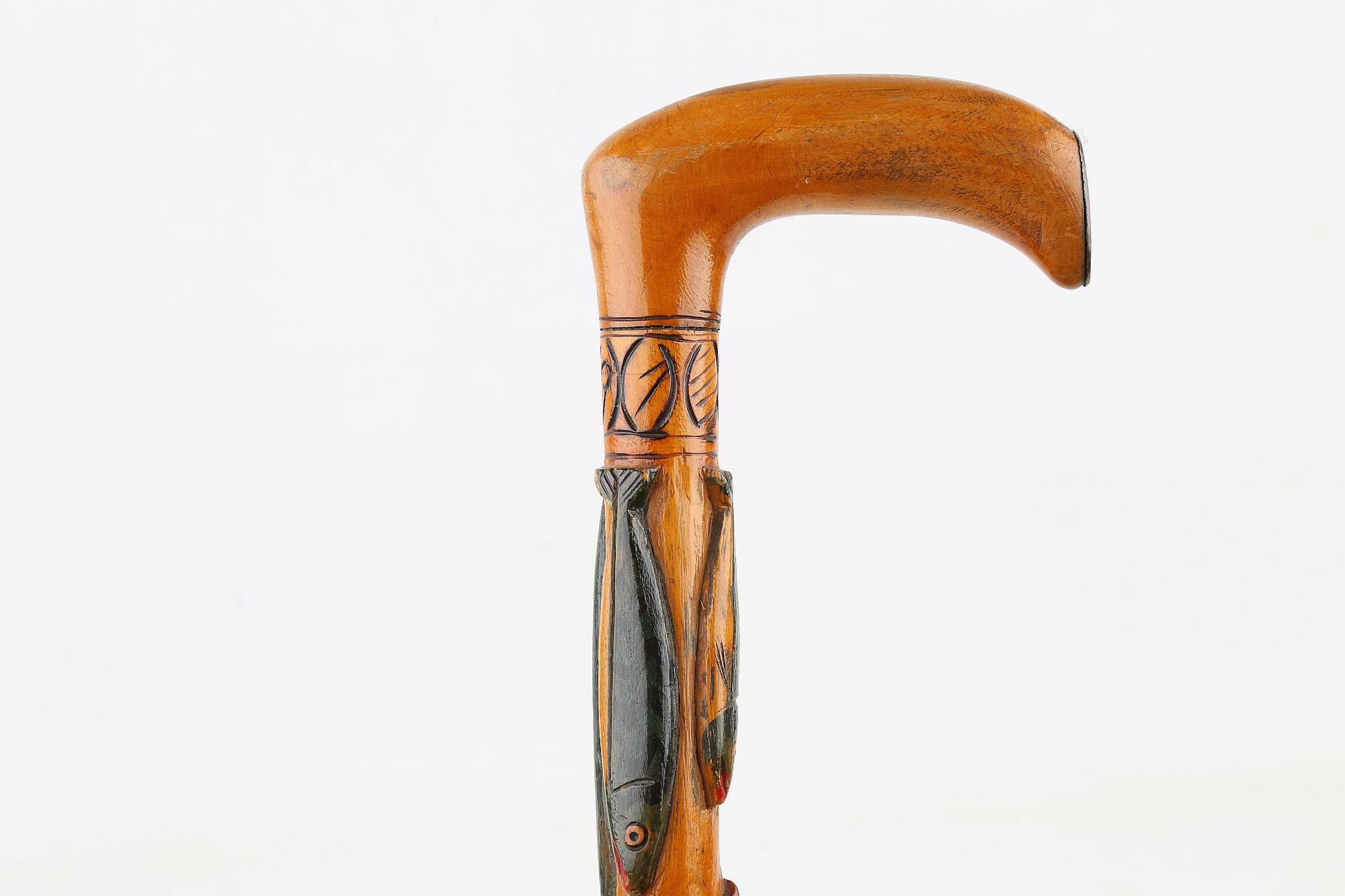 A SWEDISH FOLK ART WALKING STICK DATED 1891, with carved and painted fish, 31 inches (78cm).