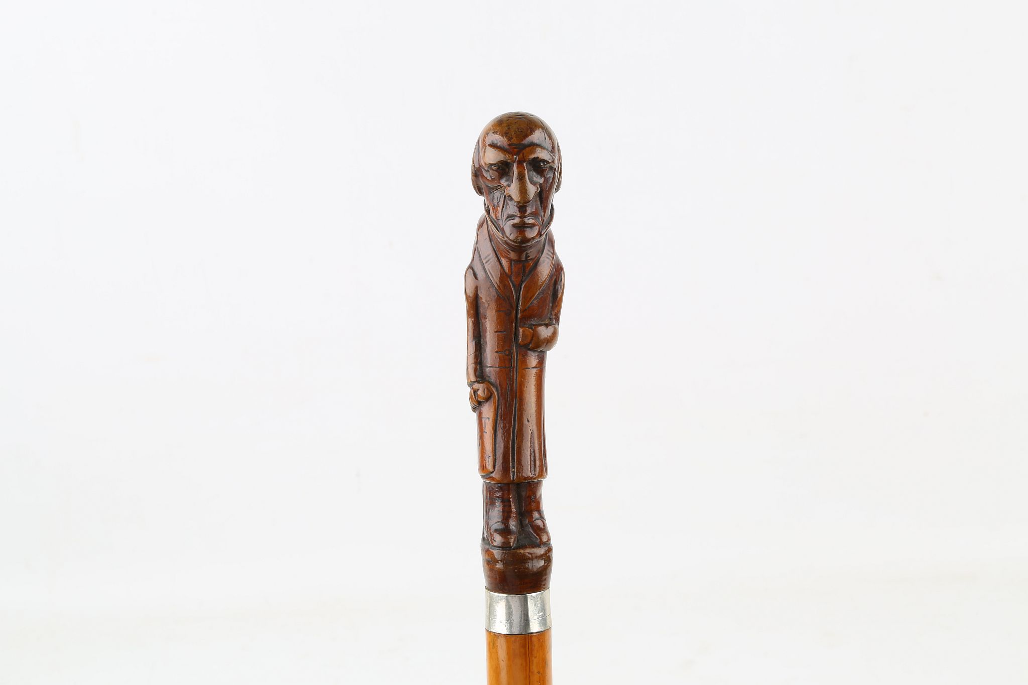 A MALACCA CANE, mounted with a full length figure of William Ewart Gladstone, 36 inches (92cm).