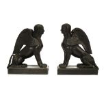 A PAIR OF WEDGWOOD BLACK BASALT EGYPTIAN STYLE FIGURES OF WINGED SPHINXES, early 19th century,