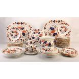 AN EXTENSIVE ENGLISH IRONSTONE CHINA IMARI DINNER SERVICE, circa 1820, decorated in red, blue and