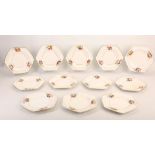 A SET OF TWELVE HEXAGONAL SPODE PORCELAIN PLATES, circa 1815, the rims finely painted with sprays of