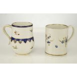 A CHELSEA-DERBY PORCELAIN MUG AND A WORCESTER PORCELAIN MUG, circa 1770-80, the Chelsea-Derby