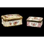 TWO ENGLISH ENAMEL SNUFF BOXES, late 18th century, the smaller probably Staffordshire, the lid